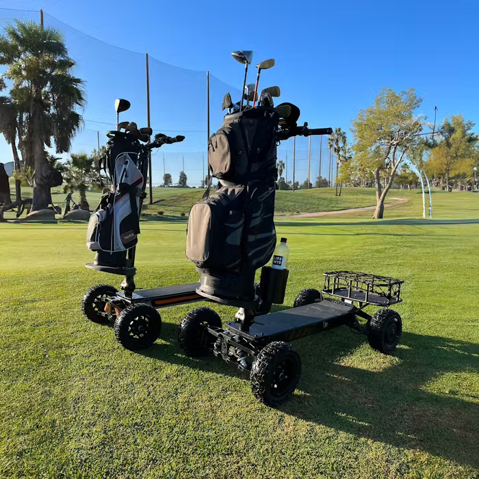 CycleBoard X-Quad 3000 electric 4-wheel trail and fairway ride with 11x4" or 13x4" fat tire treads, optional golf bag mount, rear basket storage, lean-to-steer control, fenders, and long-range battery. Black or Grey. Free shipping at e-boarders.com