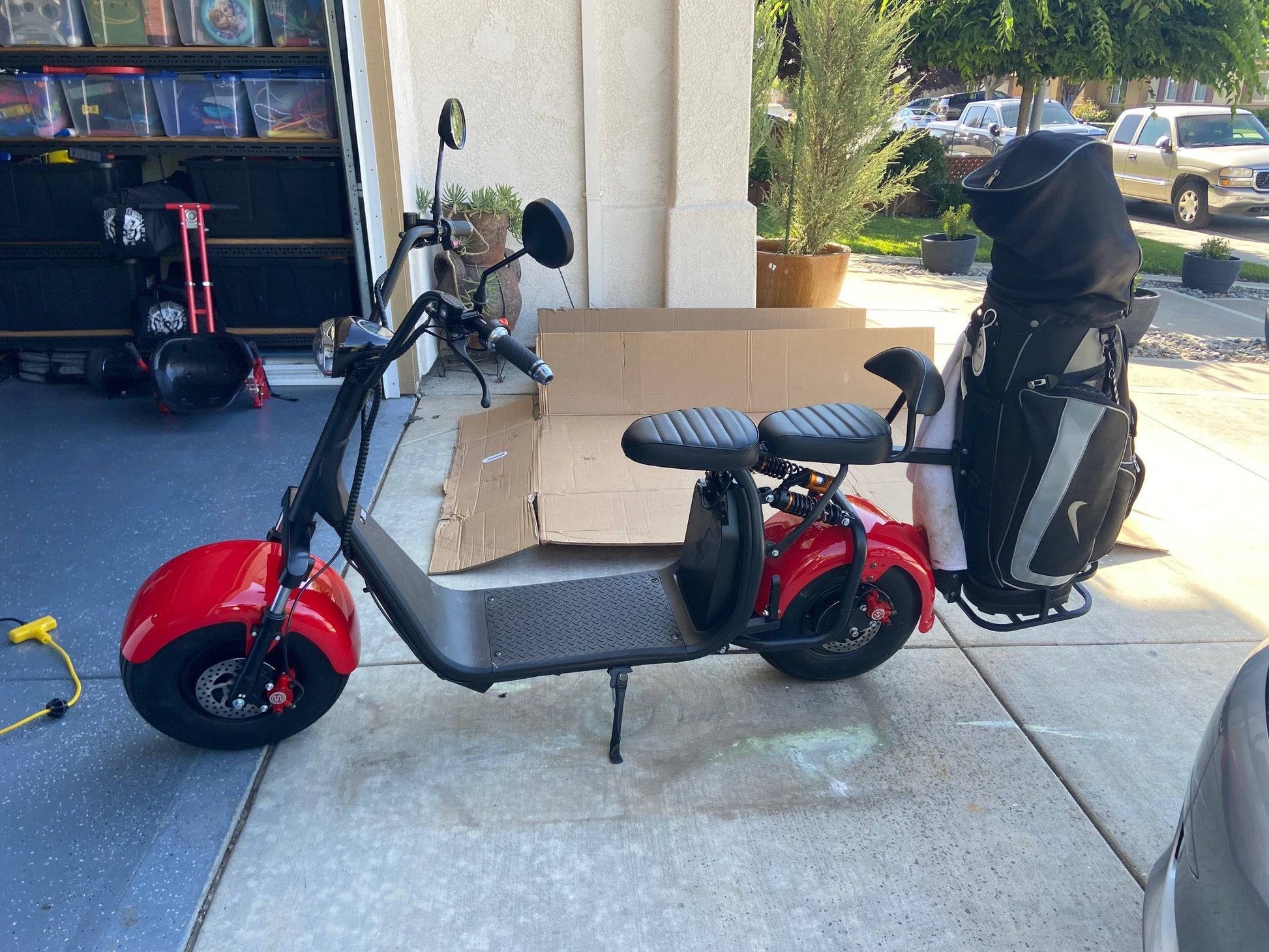 Soversky X7 Electric Golf Caddy designed for golfers and fairway golf courses with golf bag mount, fat tires and 18+ hole battery range. Black or red. Free shipping at e-boarders.com