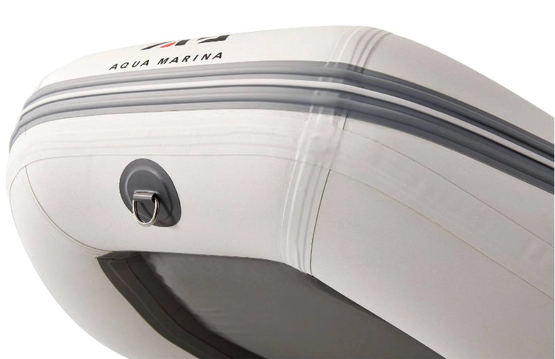 D-ring on Aqua Marina inflatable raft with paddle setup and flat floor on a calm lake. Free shipping at e-boarders.com