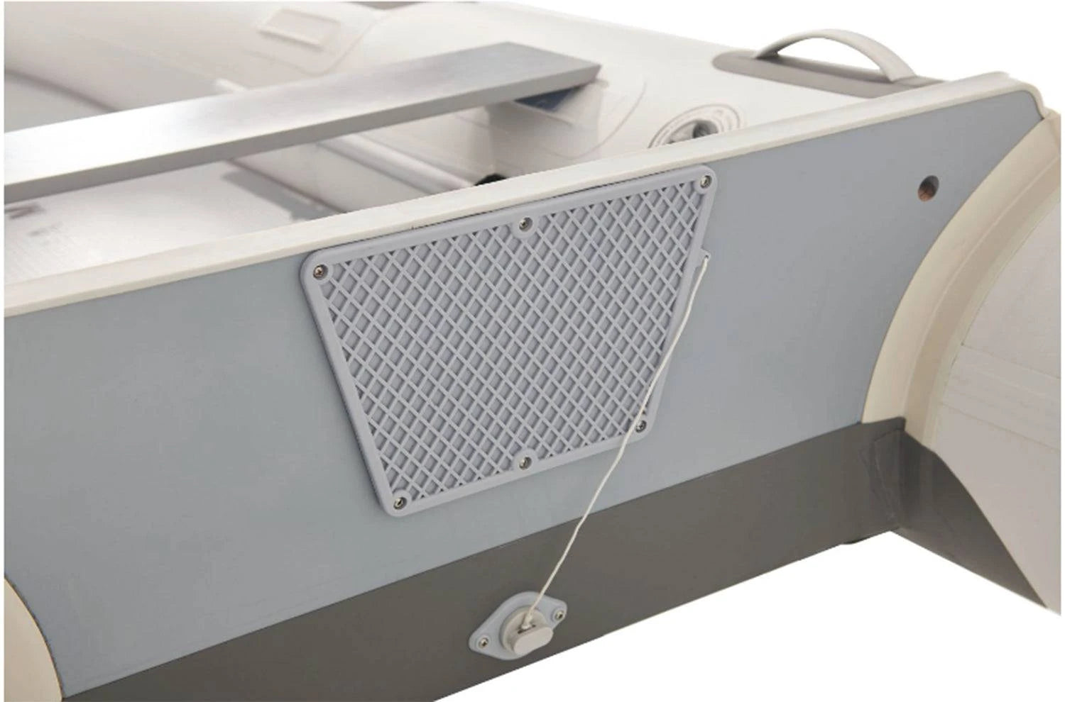 Drain valve on Aqua Marina inflatable raft with paddle setup and flat floor on a calm lake. Free shipping at e-boarders.com