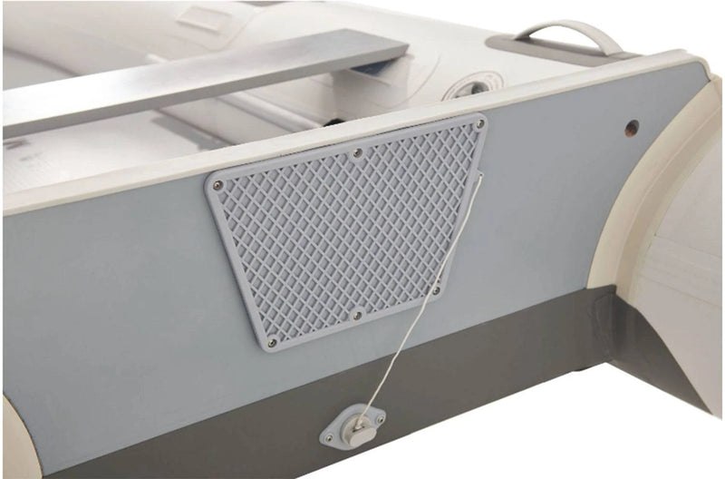 Drain valve on Aqua Marina inflatable raft with paddle setup and flat floor on a calm lake. Free shipping at e-boarders.com
