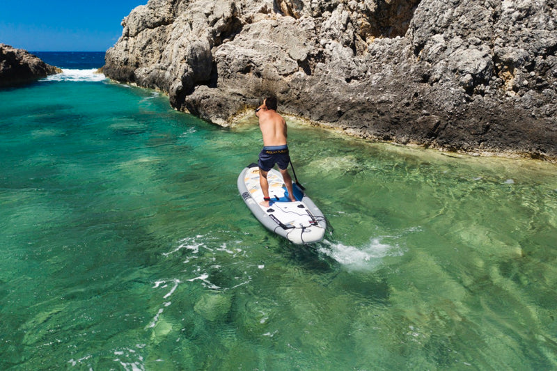 Lifestyle photo man on Aqua Marina Drift iSUP with rod holder — ships free at e-boarders.com