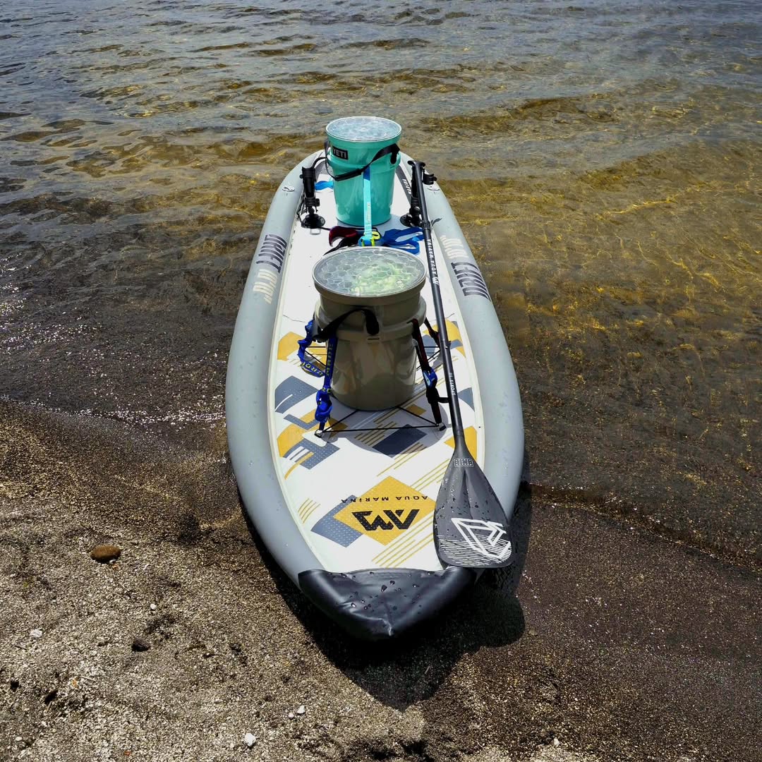 Lifestyle photo Aqua Marina Drift iSUP with rod holder — ships free at e-boarders.com