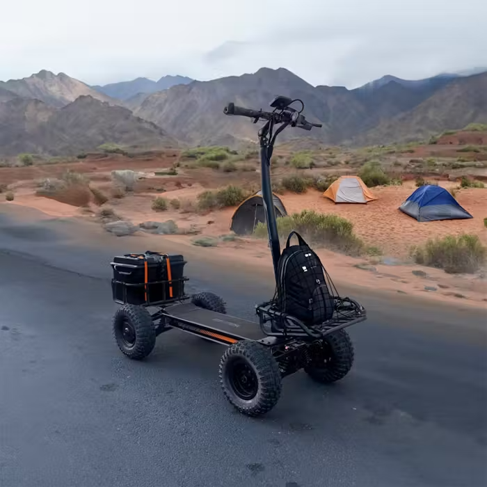 CycleBoard X-Quad 3000 all-terrain 4-wheel recreational electric ride for camping, golf course fairways, dirt trails, boardwalk paths, with fat tires, lean-technology, and independent suspension. Add-on storage accessories available for golfing and exploring adventures. Free shipping at E-Boarders.com