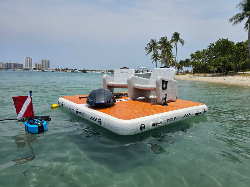 PopBoard Inflatable Dock, Inflatable Chair Set and Inflatable Table floating on the water, available at e-boarders.com