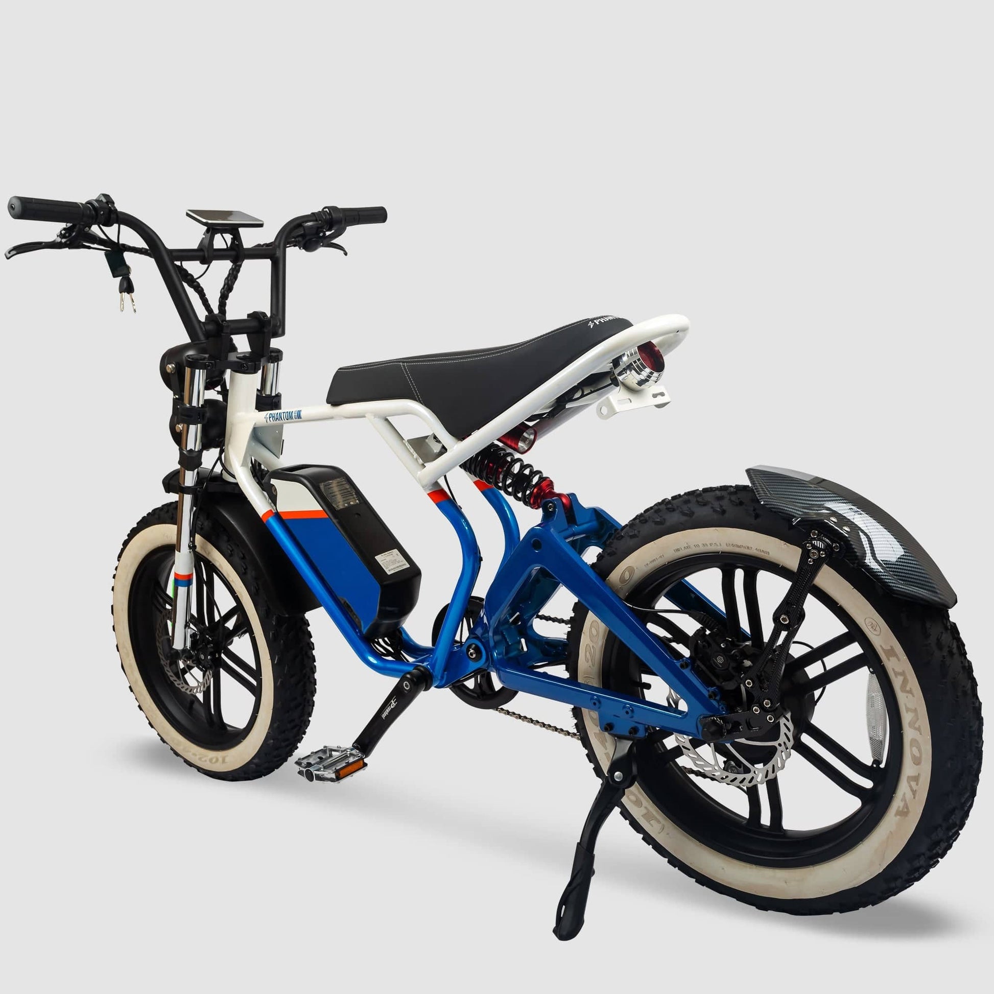 Phantom Gogo Klutch Cafe Max P20 Fat Tire electric bicycle E-Bike, blue and white, wtih pedal-assist 52 MPH, 53 Mile Battery Range. Color options are silver, silver, blue, pink. Free shipping at eBoarders.com