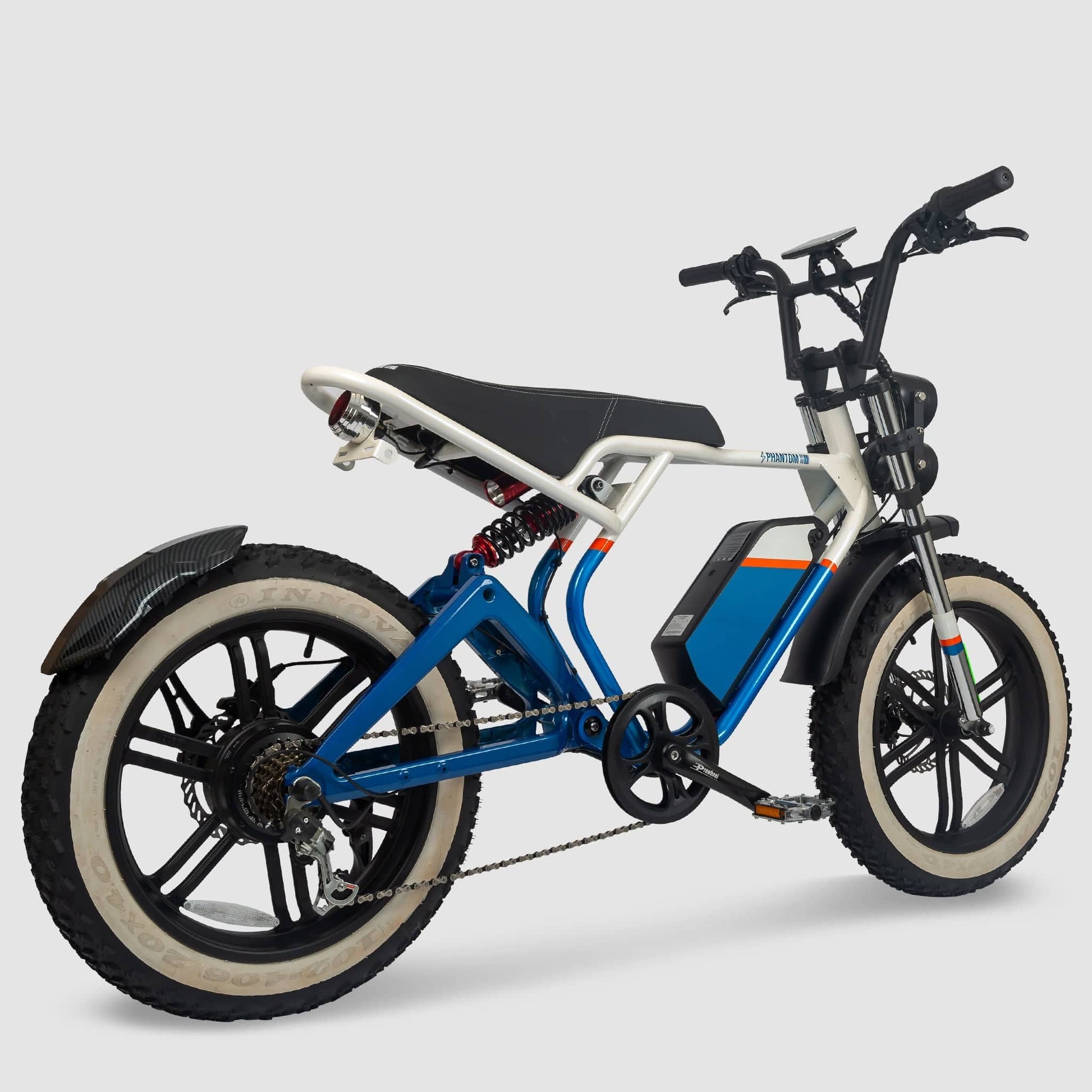 Phantom Gogo Klutch Cafe Max P20 Fat Tire electric bicycle E-Bike, blue and white, wtih pedal-assist 52 MPH, 53 Mile Battery Range. Color options are silver, silver, blue, pink. Free shipping at eBoarders.com