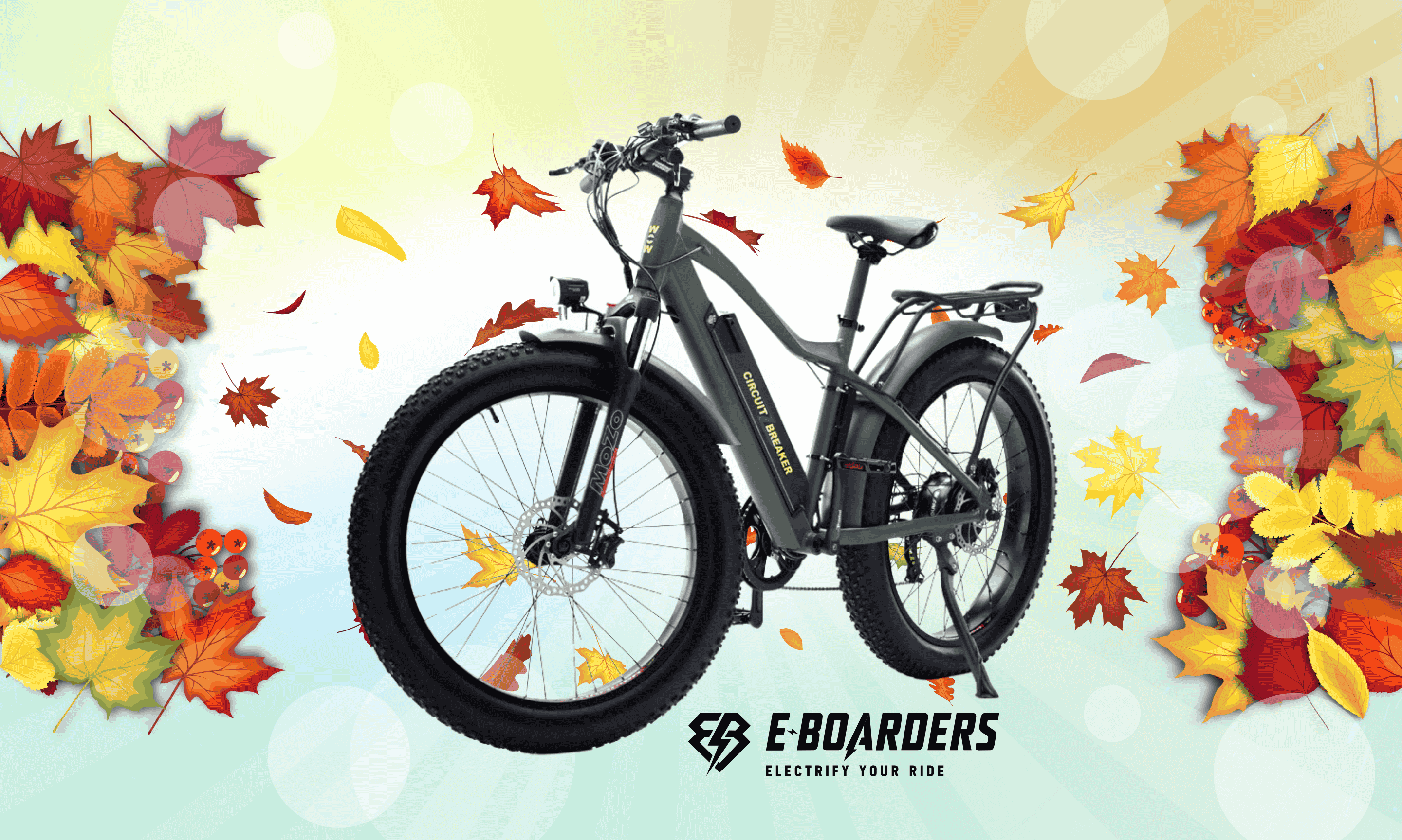 Oh Wow Cycles Electric Bike for Beach Cruising, Dirt biking or Mountain Biking. Fall leaves background. E-Bike availble at E-Boarders