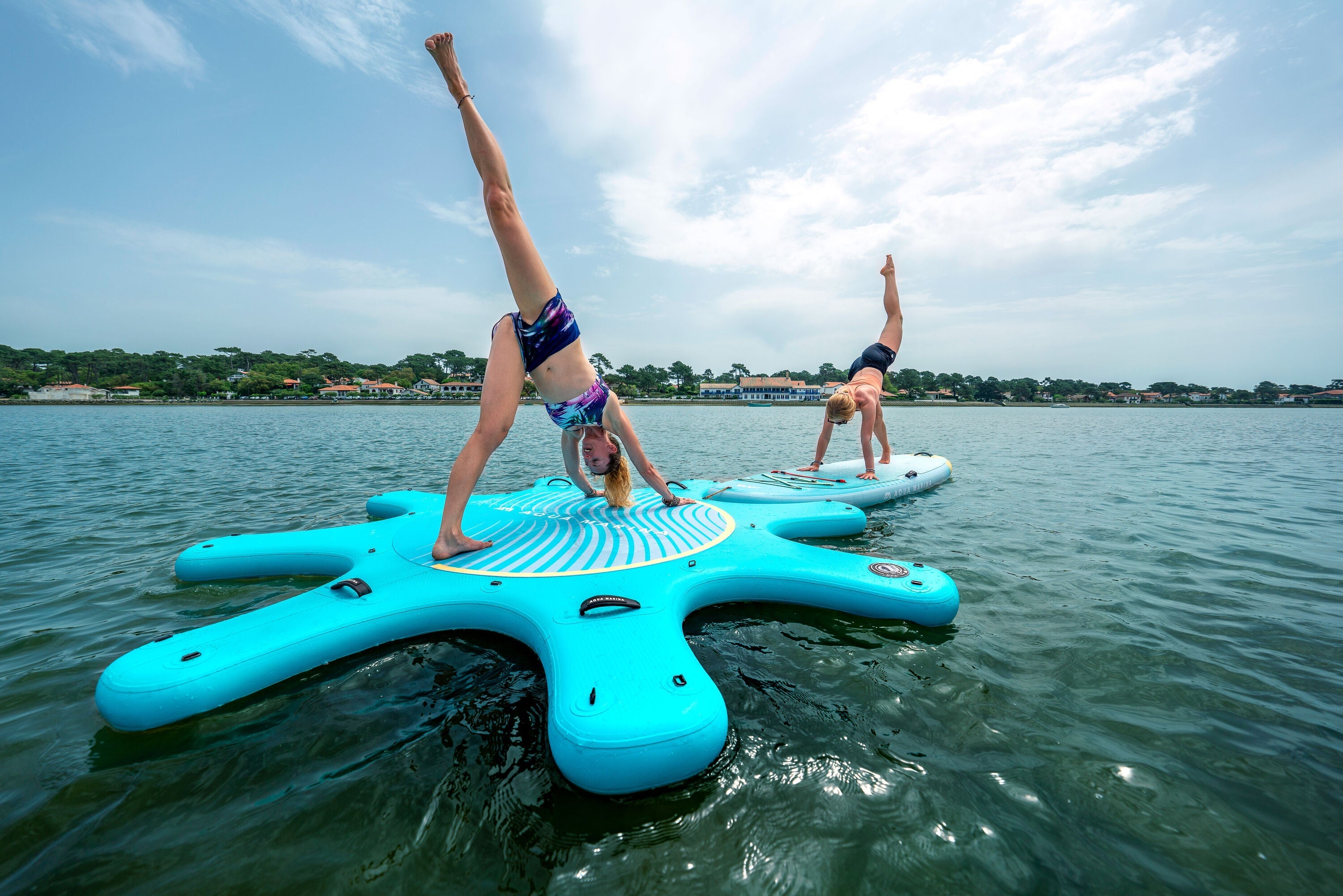 Inflatable yoga instructor platform for group water sessions – ships free at e-boarders.com