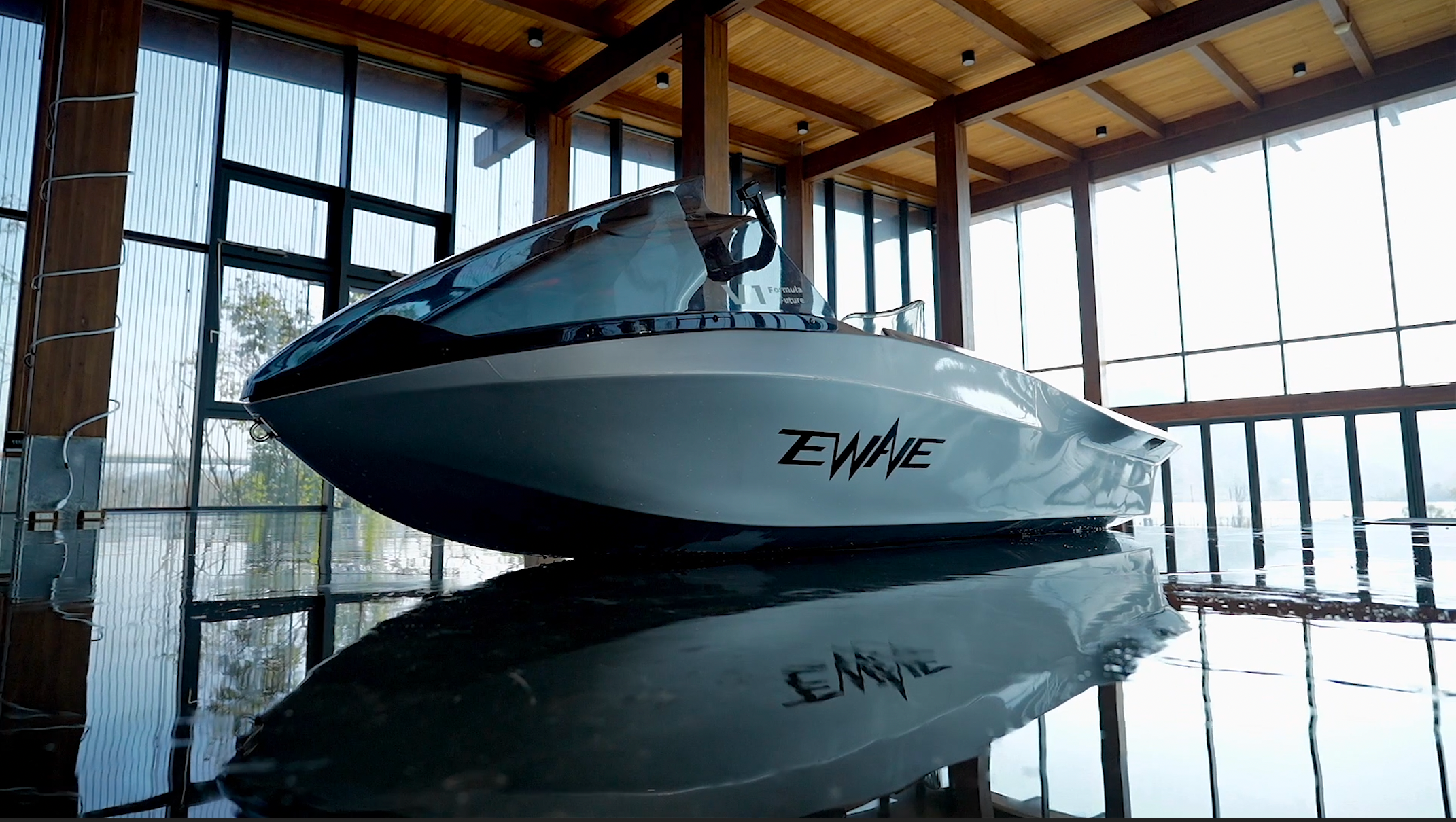 Seated electric surf-style lake ride with throttle control. Ships free from e-boarders.com.