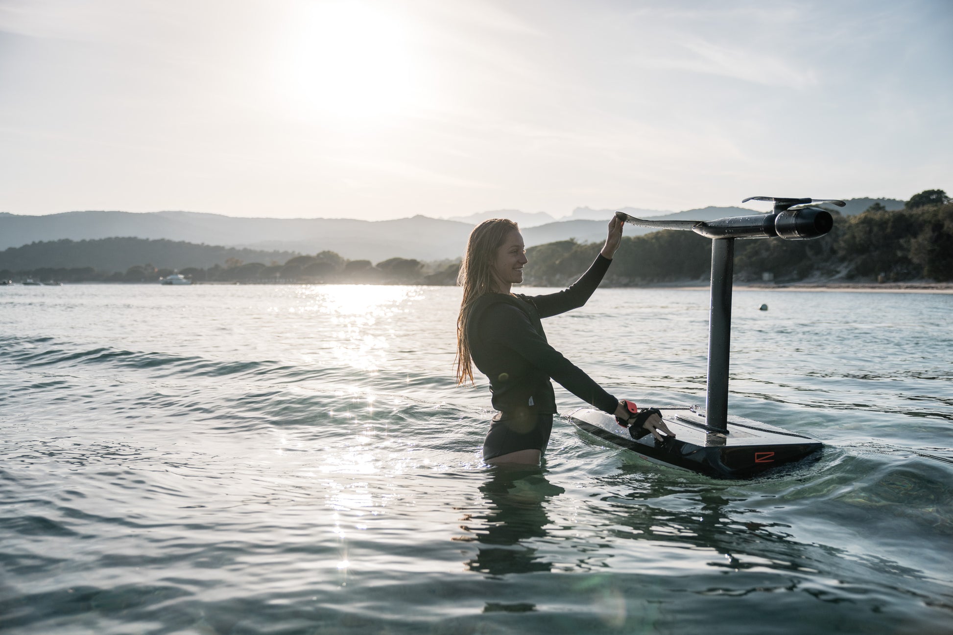 e-boarders-eboarders-awake-impact-safety-vest-harness-floatation-ravik-vinga-footstraps-foot-straps-wireless-hand-controller-remote-battery-charger-powerkey-jetboard-efoil-standard-range-extended-range-watersports-water-sports-electric-wakeboard-surfboard-ejetboard-efoil-ewakeboard-epaddleboard-eboard-woman-in-water-safety-vest-efoil